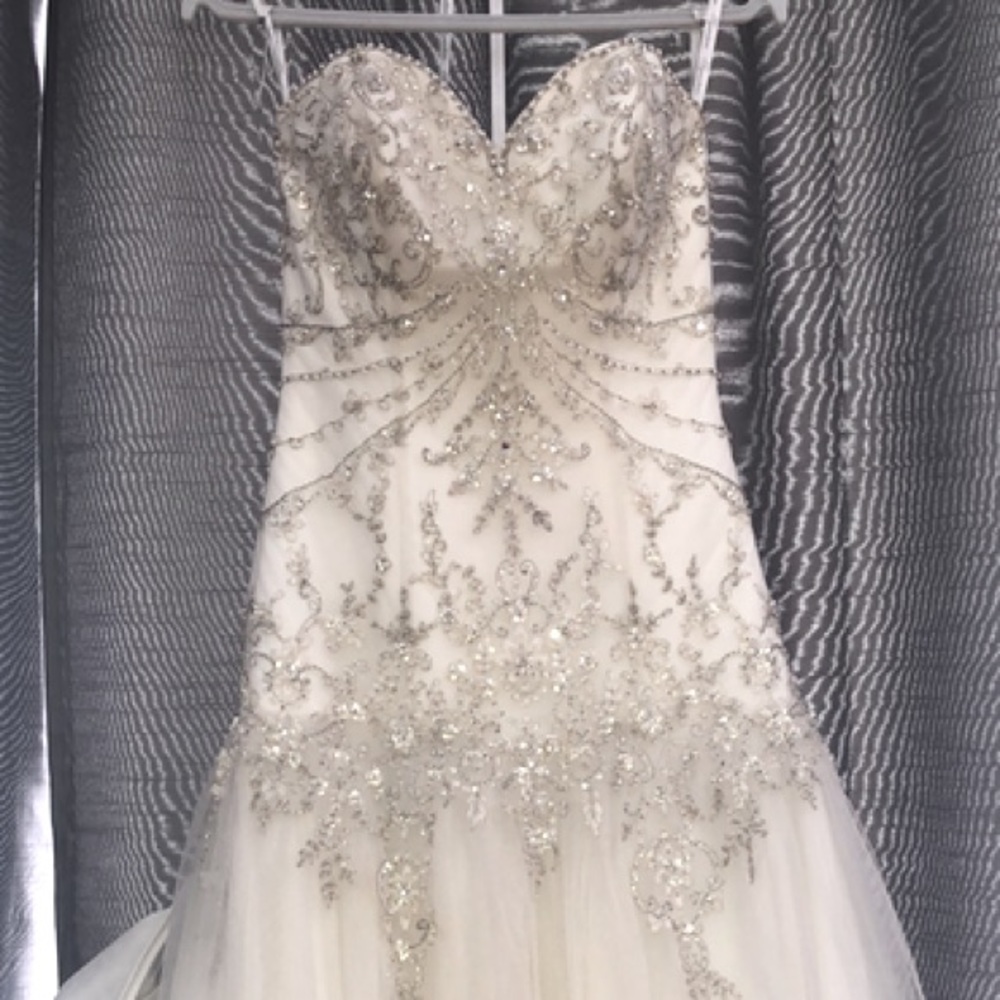 Beautiful tulle with train wedding dress